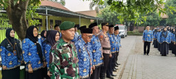Babinsa Serma Erau Hadiri Upacara KORPRI Jadi Simbol Komitmen TNI-ASN Wujudkan Tata Kelola Unggul
