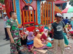Babinsa koramil 0816/01 Pam perayaan imlek tahun 2020