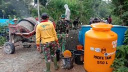 Banyak Tandon Air Sudah Diisi Penuh di Pengerjaan Jalan Desa