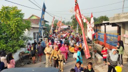 Babinsa Ramil0816/07 Ikut Jalan Santai dlm rangka HUT RI ke 77 Tahun 2022 Bersama Warga.