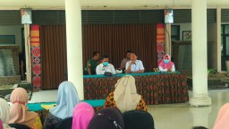 Babinsa Koramil 0816/05 Tulangan Hadiri Lokakarya Mini Lintas Sektor UPTD Puskesmas Kecamatan
