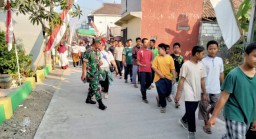 Ciptakan Rasa Aman Babinsa Desa Penatarsewu Kawal Giat Jalan Sehat Dan Karnaval