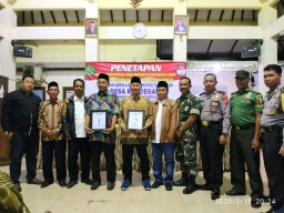 Danramil 0816/06 Tanggulangin Hadiri Penetapan Nomor Urut Calon Kades
