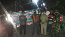 Jaga check point Covid19,Babinsa Prambon dan Babinkamtibmas bersinergi