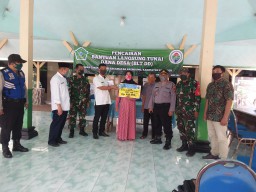 Danramil 07/ Krembung Hadiri pembagian BLTDD di 4 Desa.