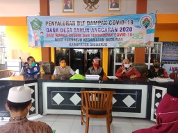 Babinsa Koramil 0816/03 Buduran Dampingi Pembagian Bantuan JPS