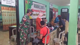 Babinsa Ramil 0816/05 Tulangan laksanakan Pengamanan Vaksinasi Covid19