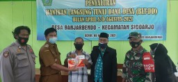 Babinsa Desa Banjar bendo Sidoarjo Pendampingan pembagian BLT
