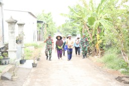 Masyarakat Desa Penambangan Sambut Gembira Peningkatan Paving Jalan dari Program TMMD