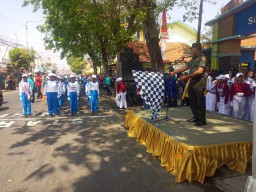 Semarakkan HUT RI Ke-79, Danramil Beserta Babinsa Koramil 05/Tulangan Pendampingan Gerak Jalan