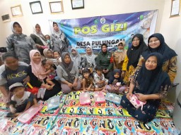 Babinsa Koramil 0816/18 Sedati Dukung Peningkatan Gizi Balita melalui Program Pos Gizi di Desa Pulungan
