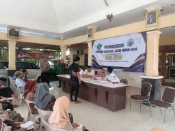 Babinsa dan Bhabinkamtibmas Desa Wedi Dampingi Penyerahan BLT Dana Desa Tahap 1-3 TA 2025