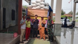 Sinergi TNI dan Petani Demi Ketahanan Pangan, Babinsa Serka Henki Dampingi Panen Padi di Desa Plaosan