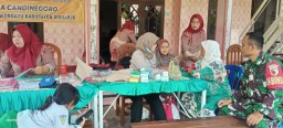 Babinsa Koramil 0816/13 Wonoayu Dampingi Posyandu di Desa Candinegoro: Wujud Kepedulian untuk Generasi Sehat, Cerdas, dan Kuat