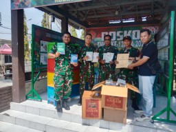 Dukung Literasi Desa, Satgas TMMD ke-126 Kodim 0816/Sidoarjo Dampingi Penyerahan Buku Bacaan dari Dinas Perpustakaan
